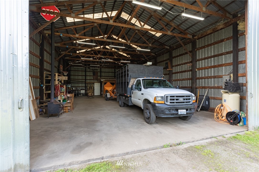 2065 East Pole Road Everson, WA 98247 - Photo 36 of 40 a view of parking garage with cars parked