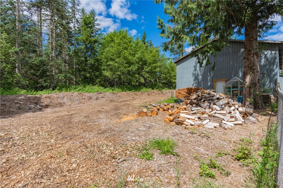 2065 East Pole Road Everson, WA 98247 - Photo 40 of 40 a wooden bench with view of trees