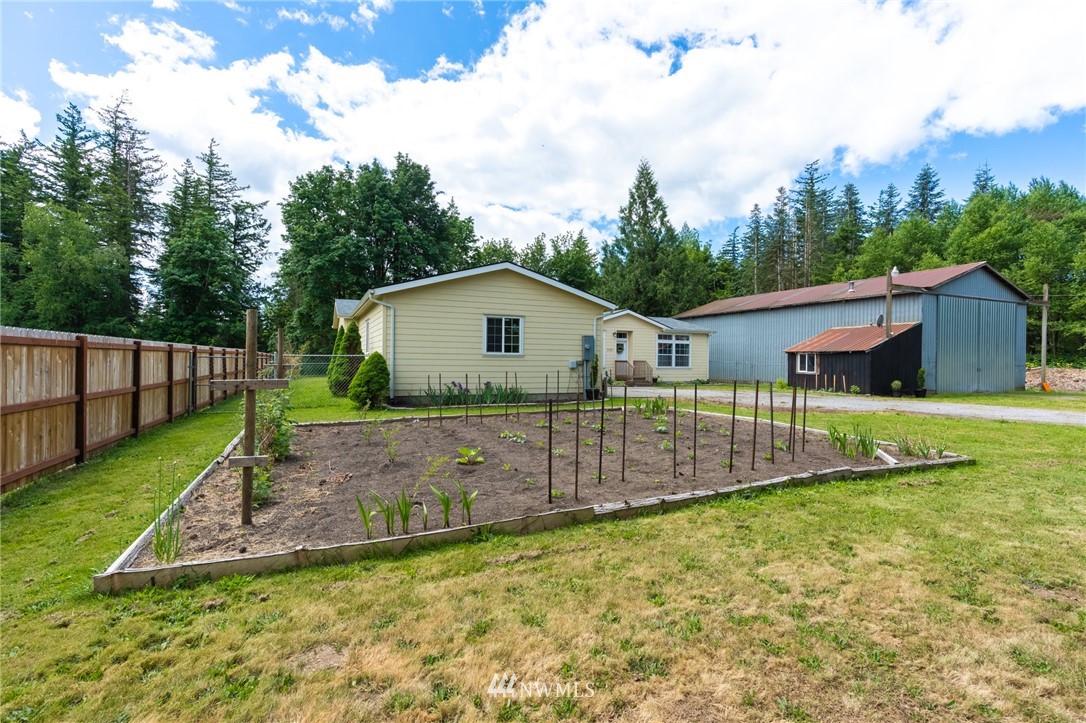 2065 East Pole Road Everson, WA 98247 - Photo 5 of 40 a view of an house with backyard space and balcony