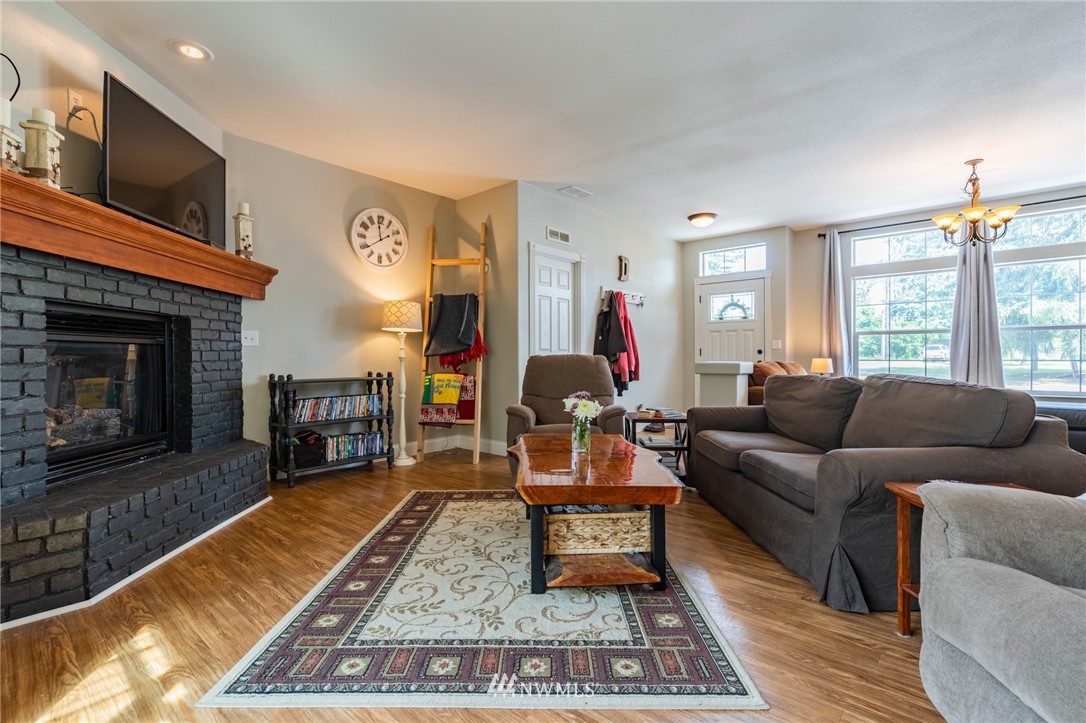 2065 East Pole Road Everson, WA 98247 - Photo 8 of 40 a living room with furniture and a fireplace