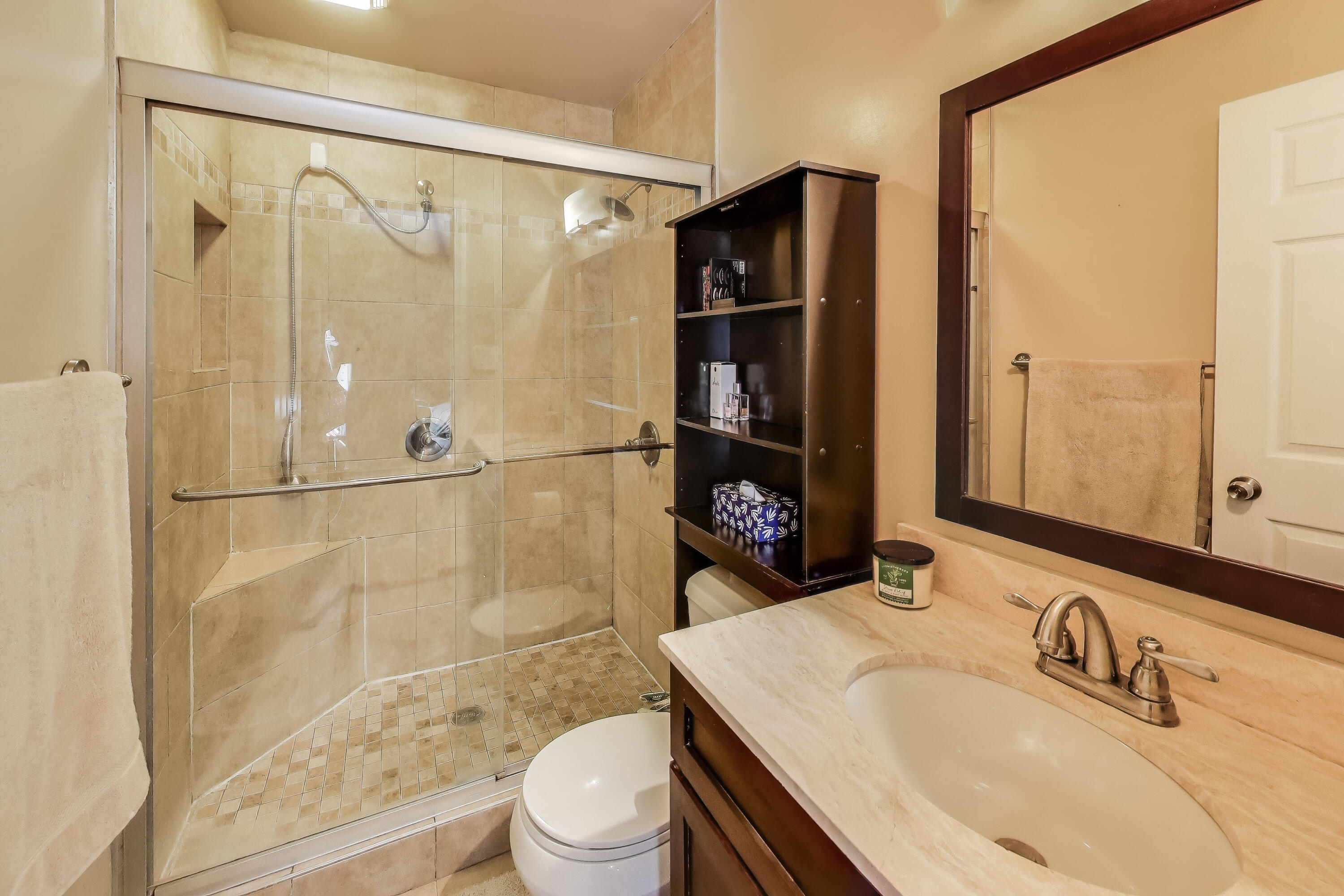 1235 West 99th Avenue Crown Point, IN 46307 - Photo 20 of 54 a bathroom with a sink toilet and shower