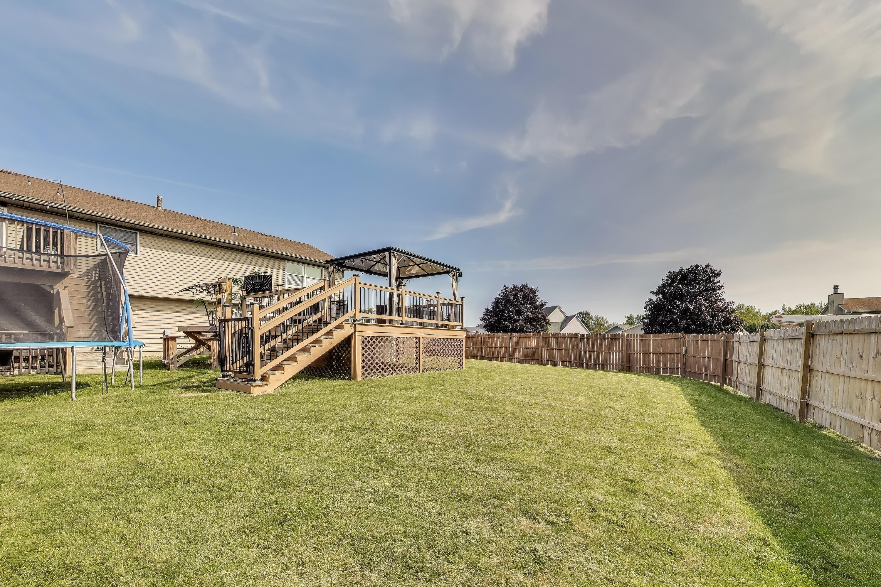 1235 West 99th Avenue Crown Point, IN 46307 - Photo 38 of 54 a swimming pool with outdoor seating and yard