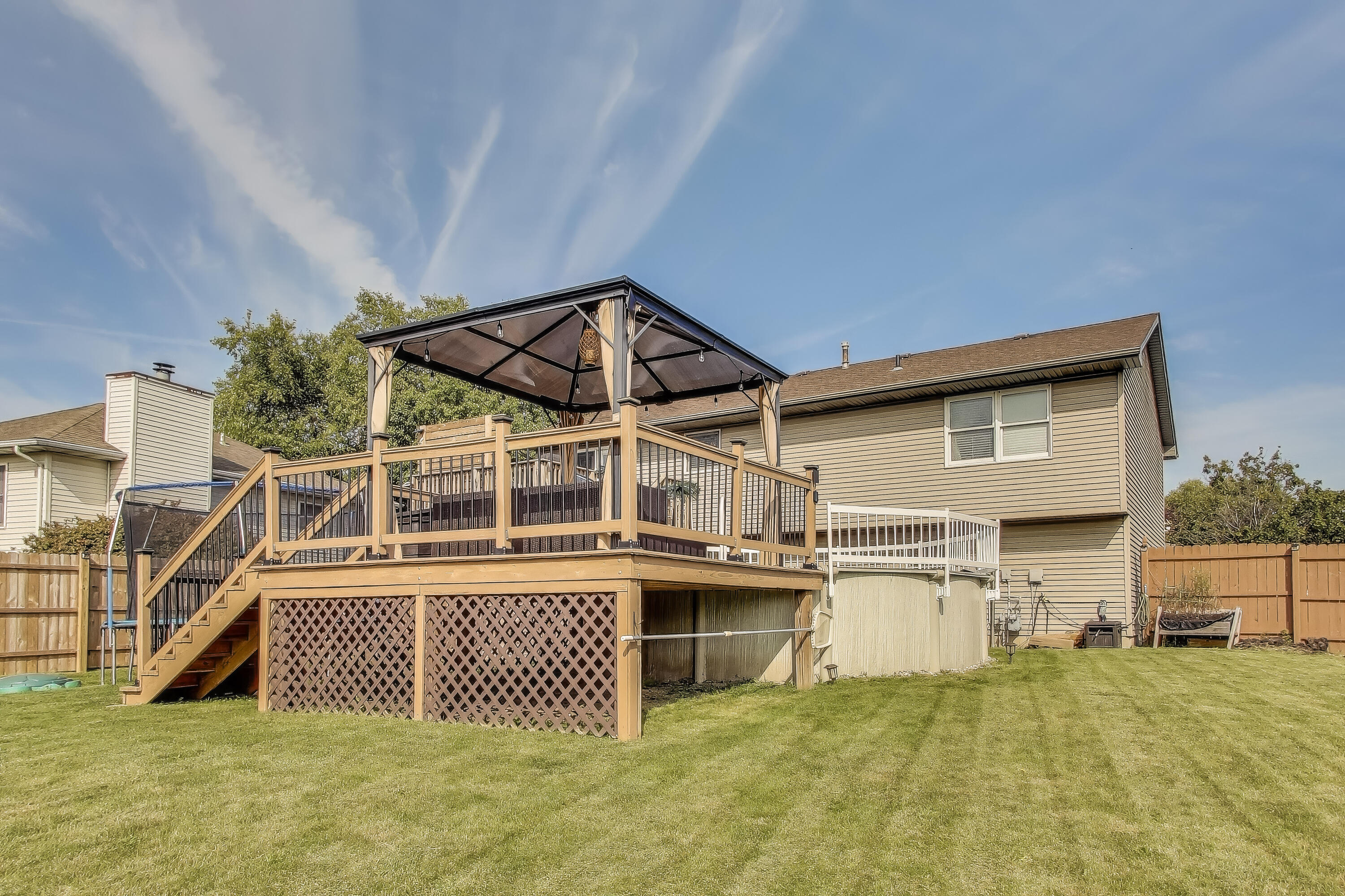 1235 West 99th Avenue Crown Point, IN 46307 - Photo 39 of 54 front view of a house with a yard
