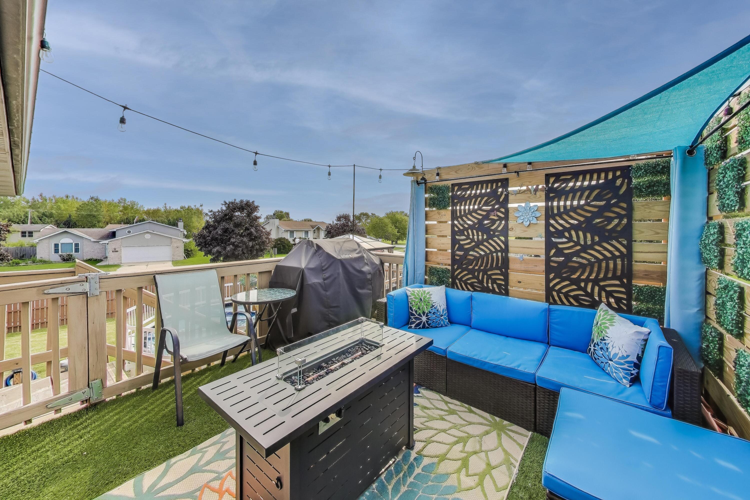 1235 West 99th Avenue Crown Point, IN 46307 - Photo 40 of 54 a view of a chairs in the patio