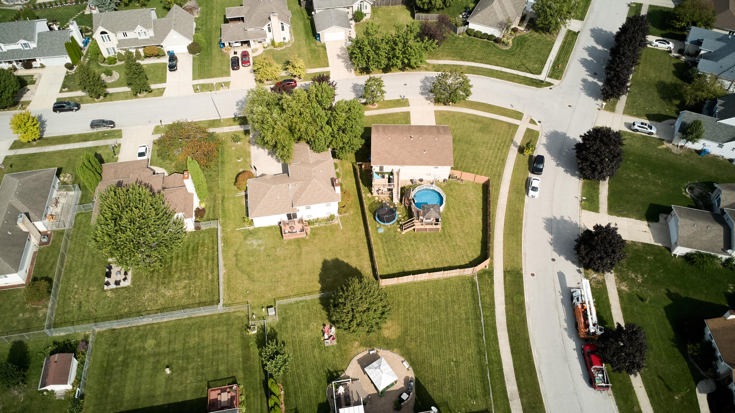 1235 West 99th Avenue Crown Point, IN 46307 - Photo 44 of 54 an aerial view of residential house with outdoor space and parking