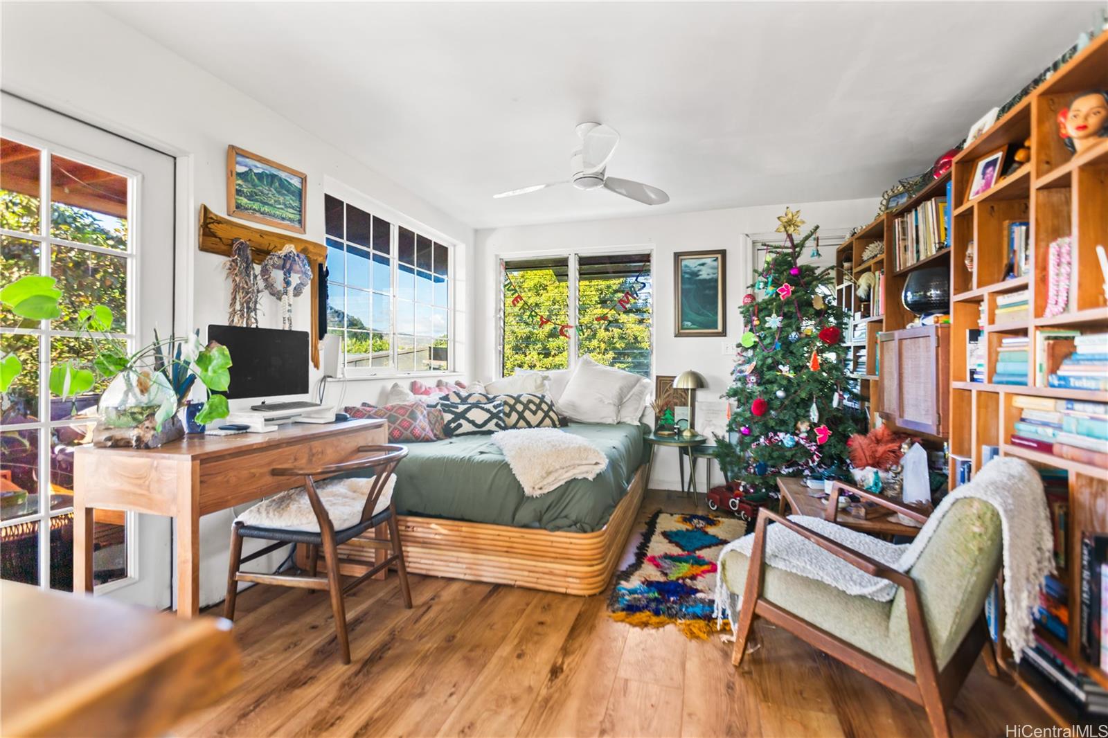 4 Kaukonahua Road Waialua, HI 96791 - Photo 12 of 25 a living room with furniture and a flat screen tv