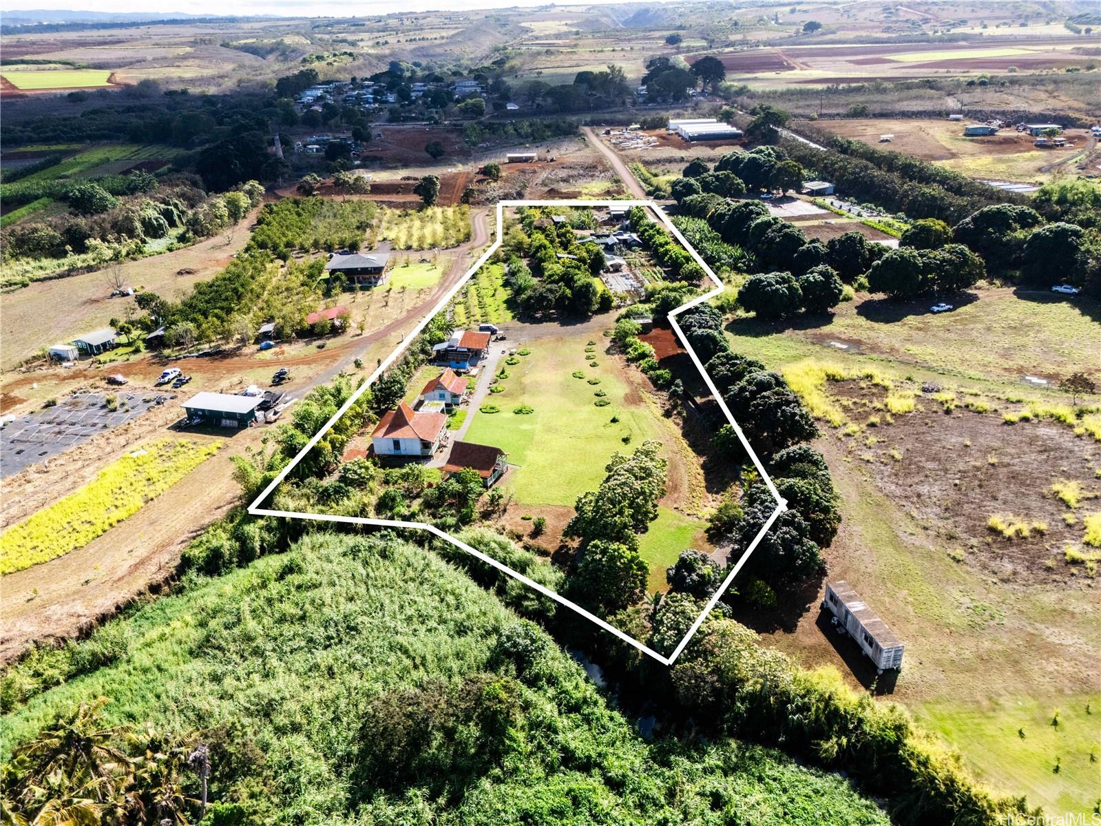 4 Kaukonahua Road Waialua, HI 96791 - Photo 2 of 25 an aerial view of swimming pool a house swimming pool and outdoor seating
