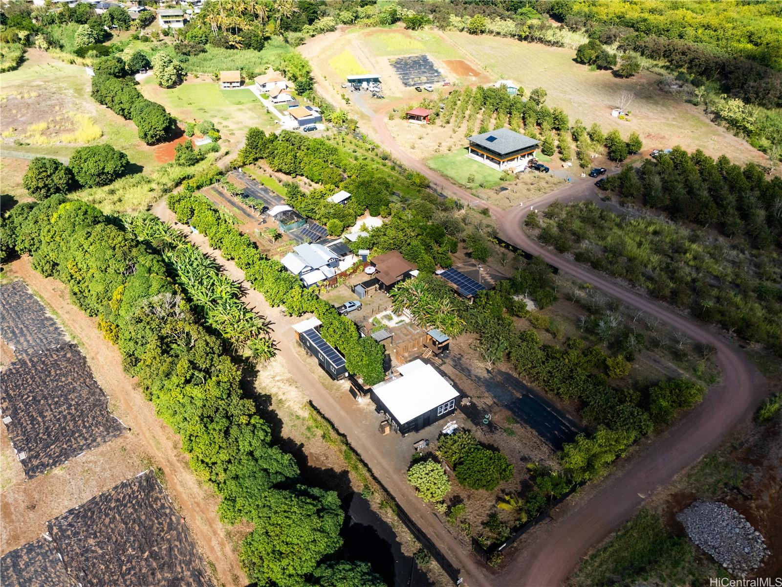 4 Kaukonahua Road Waialua, HI 96791 - Photo 24 of 25 an aerial view of a residential houses with yard
