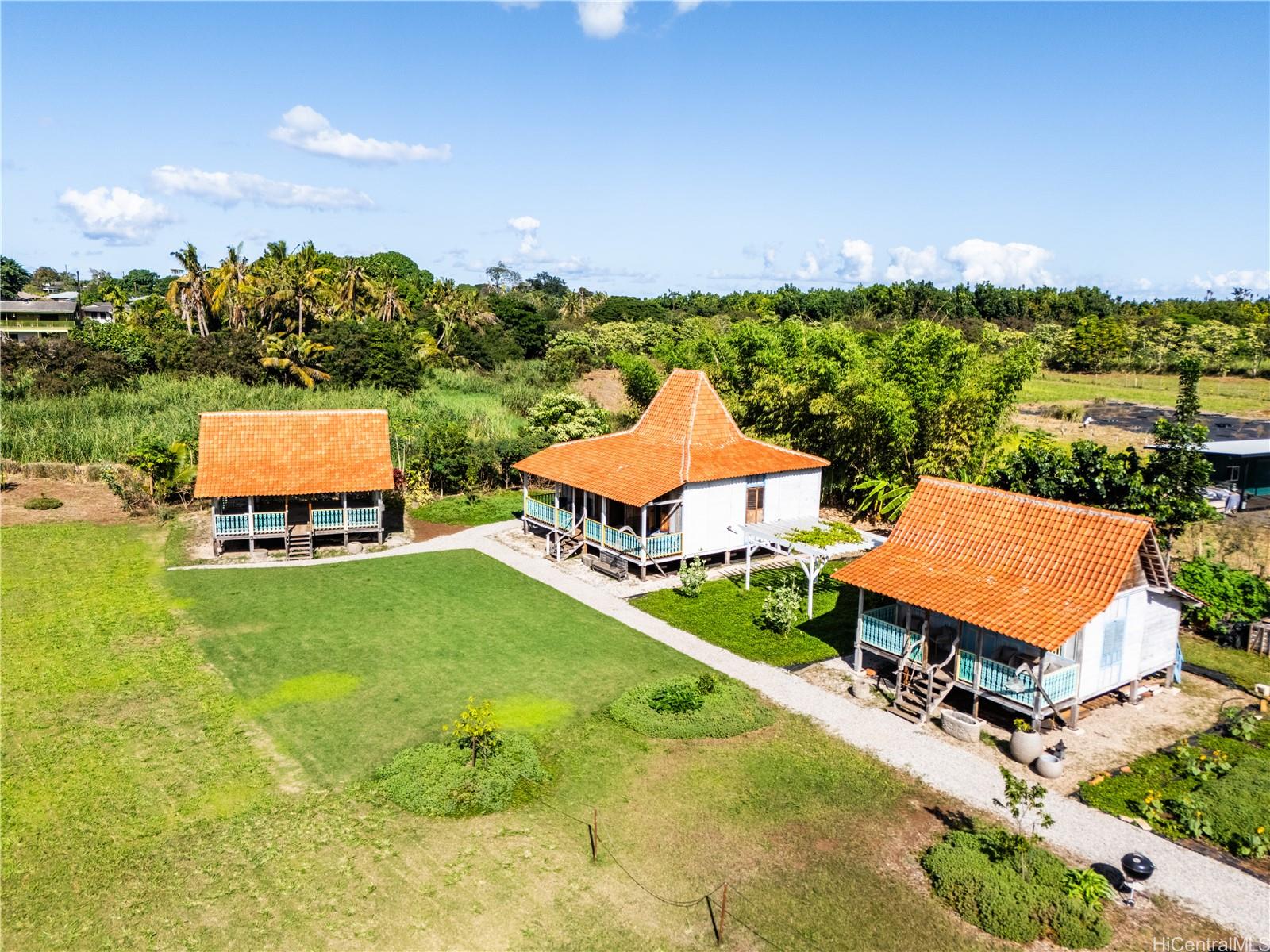4 Kaukonahua Road Waialua, HI 96791 - Photo 5 of 25 an aerial view of a house with a garden and outdoor space