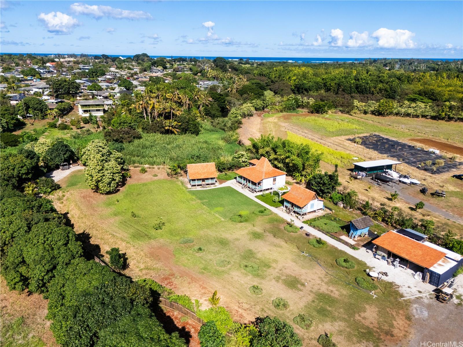 4 Kaukonahua Road Waialua, HI 96791 - Photo 6 of 25 an aerial view of a house with a swimming pool
