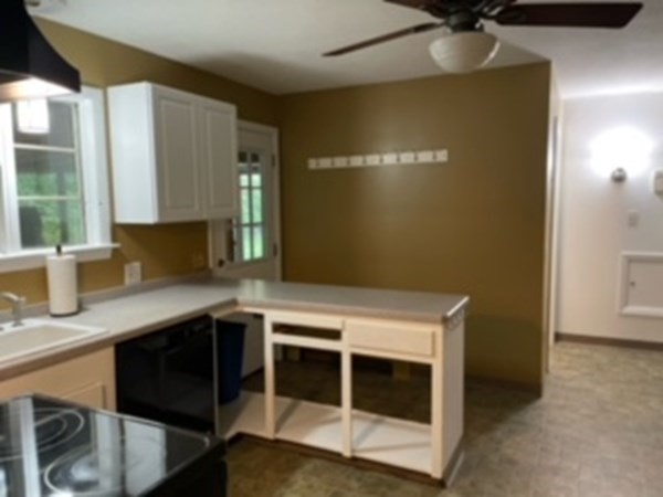 15 Steiger Road Holyoke, MA 01040 - Photo 12 of 29 a utility room with a sink and a mirror