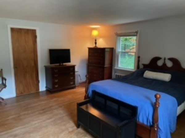 15 Steiger Road Holyoke, MA 01040 - Photo 16 of 29 a living room with furniture and a flat screen tv