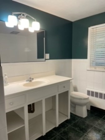 15 Steiger Road Holyoke, MA 01040 - Photo 19 of 29 a bathroom with a sink toilet and a mirror