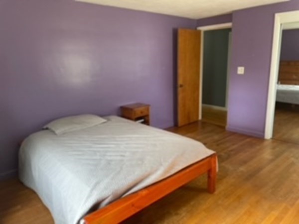 15 Steiger Road Holyoke, MA 01040 - Photo 22 of 29 a bed sitting in a bedroom next to a window