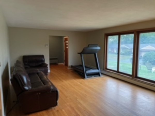 15 Steiger Road Holyoke, MA 01040 - Photo 7 of 29 a living room with furniture and a flat screen tv