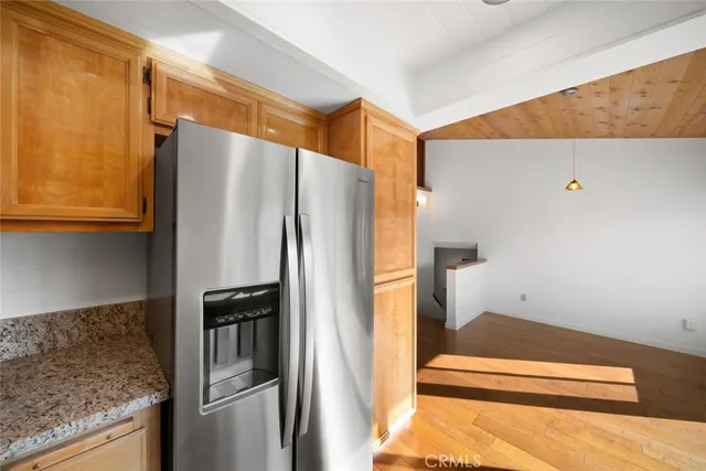 a kitchen with a sink stove and microwave