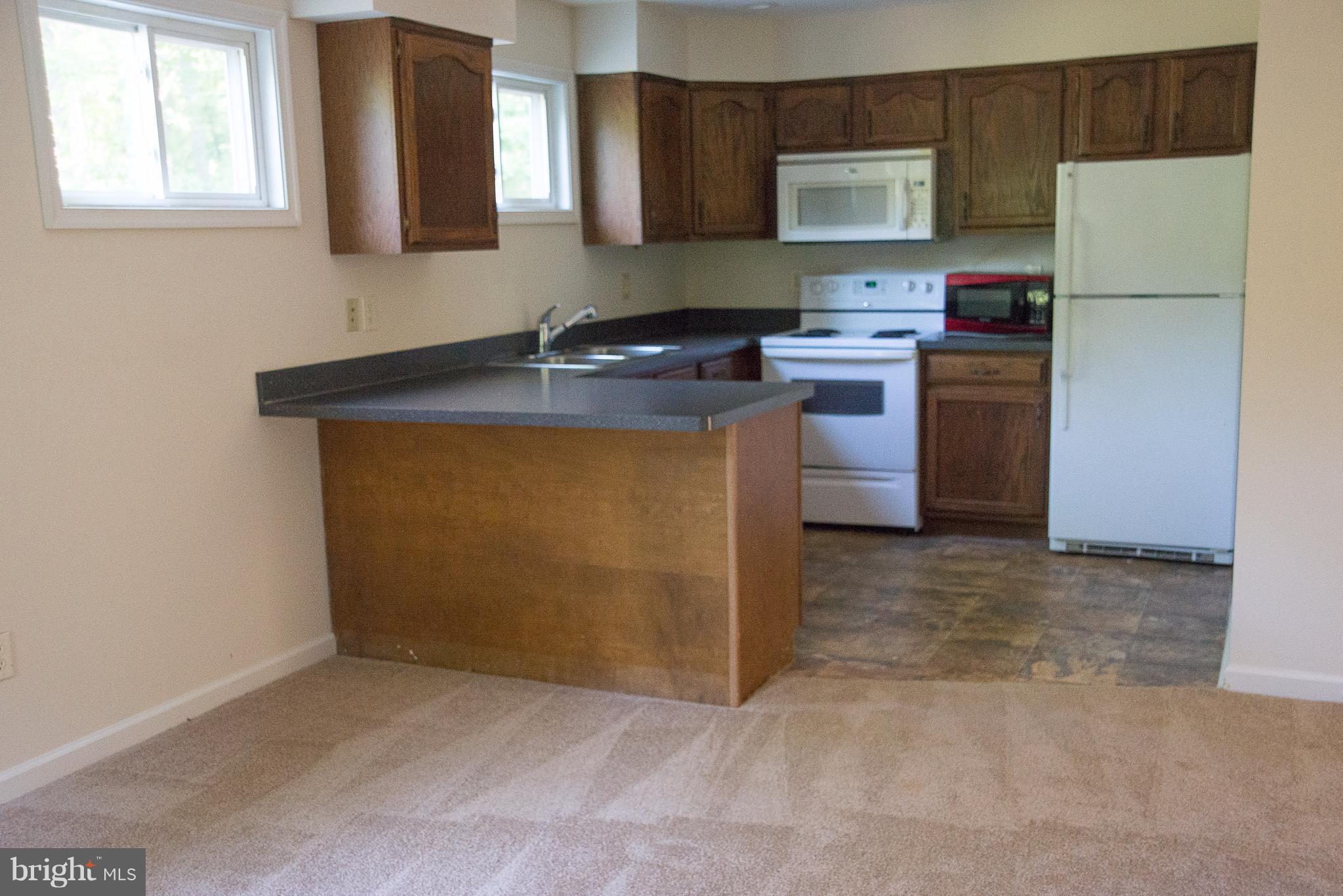 5 Ridgeview Circle Fredericksburg, VA 22406 - Photo 15 of 21 In law suite living area kitchen