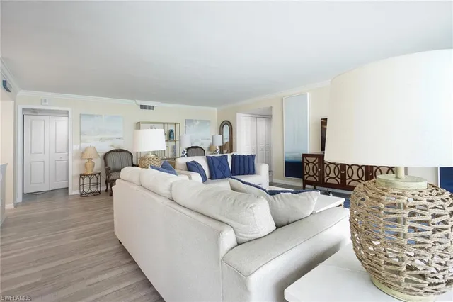 a living room with furniture and a couch