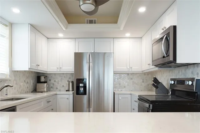 a bedroom with a bed and a window in it