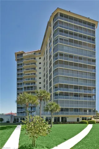 a view of a lake with a yard