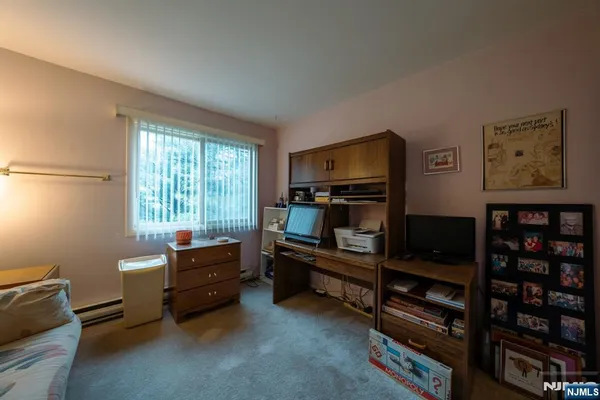 a room with furniture and a window