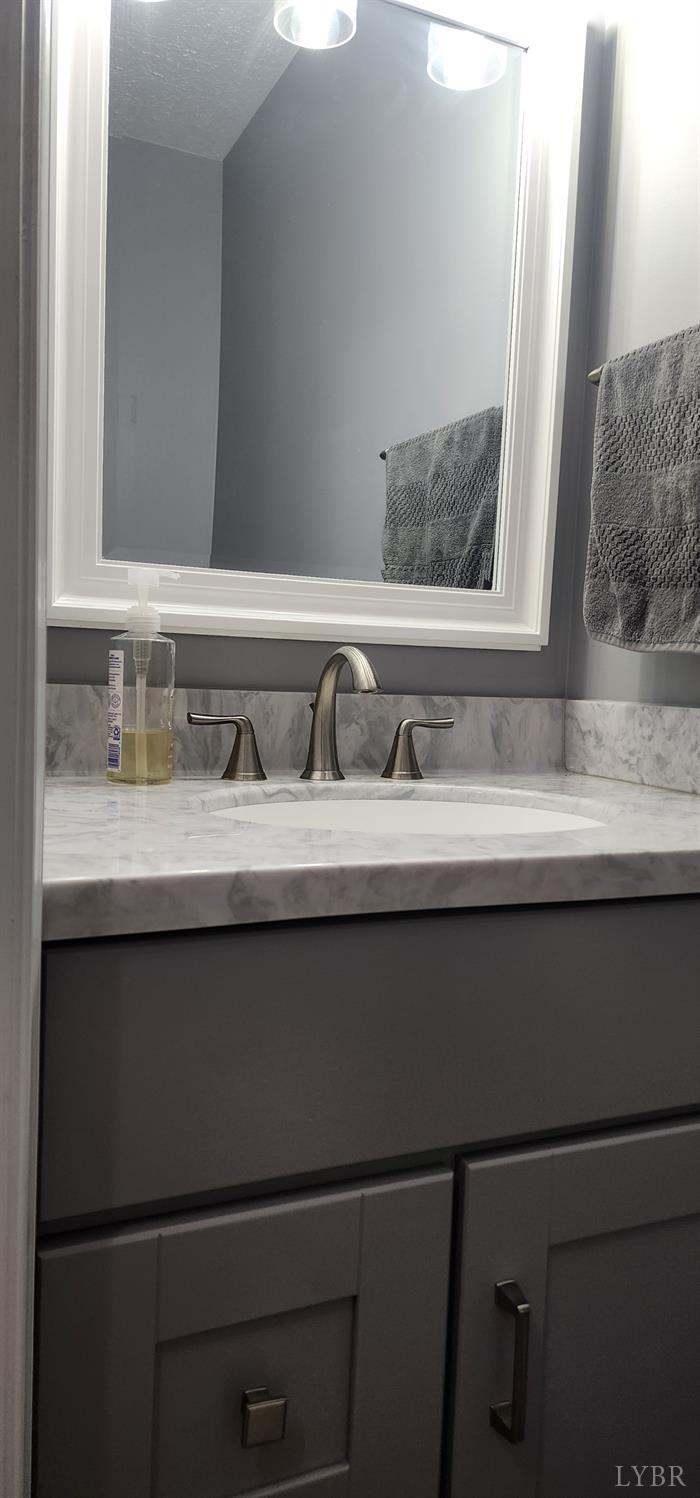 297 Poor House Farm Road Amherst, VA 24521 - Photo 16 of 52 a close view of bathroom sink