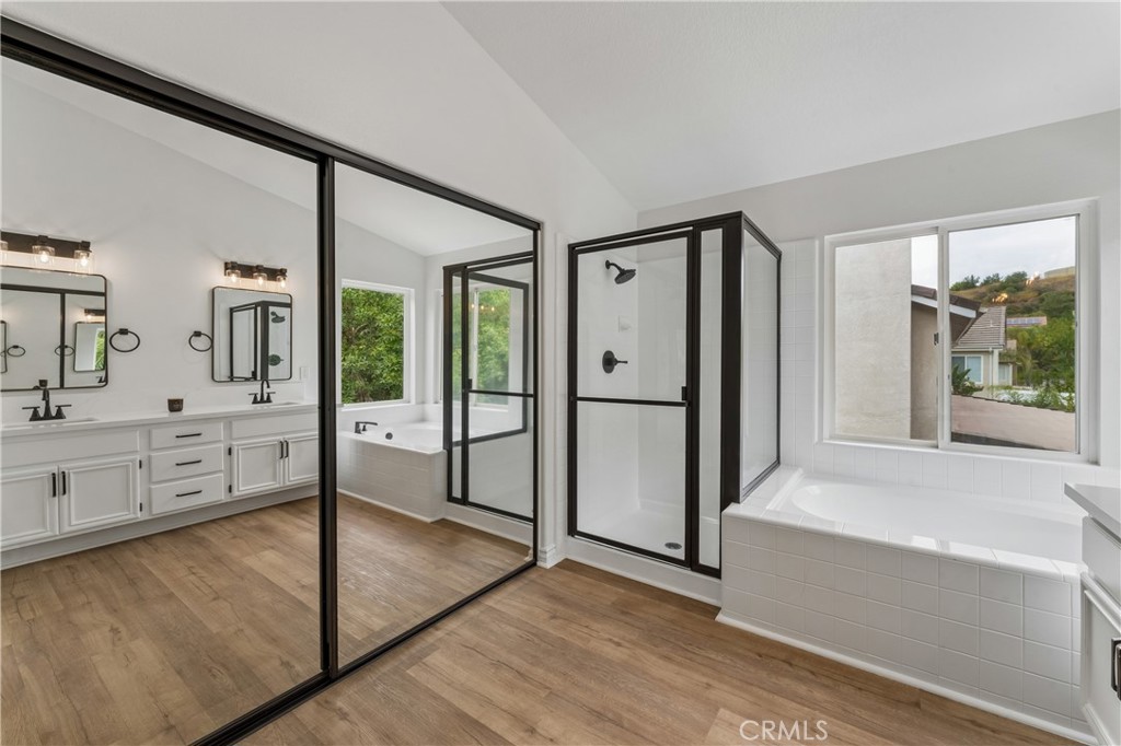 26023 Salinger Lane Stevenson Ranch, CA 91381 - Photo 17 of 35 Stunning, renovated primary bathroom featuring modern finishes and premium fixtures.