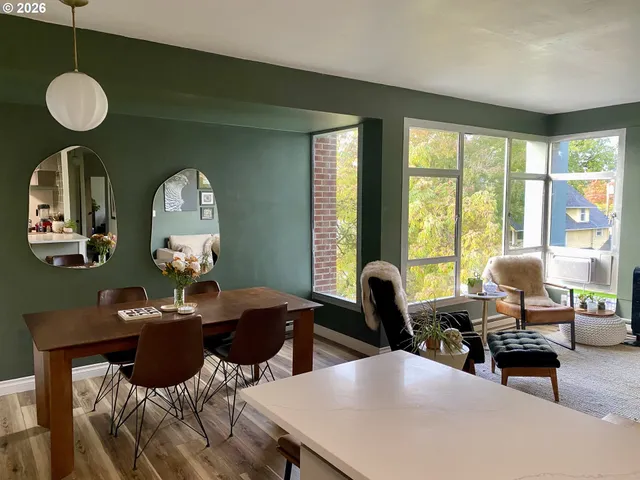 a view of a livingroom with furniture and window