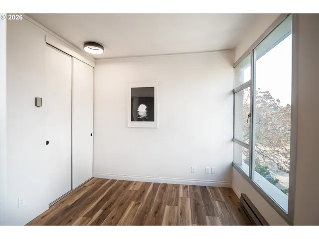 a view of an empty room and window