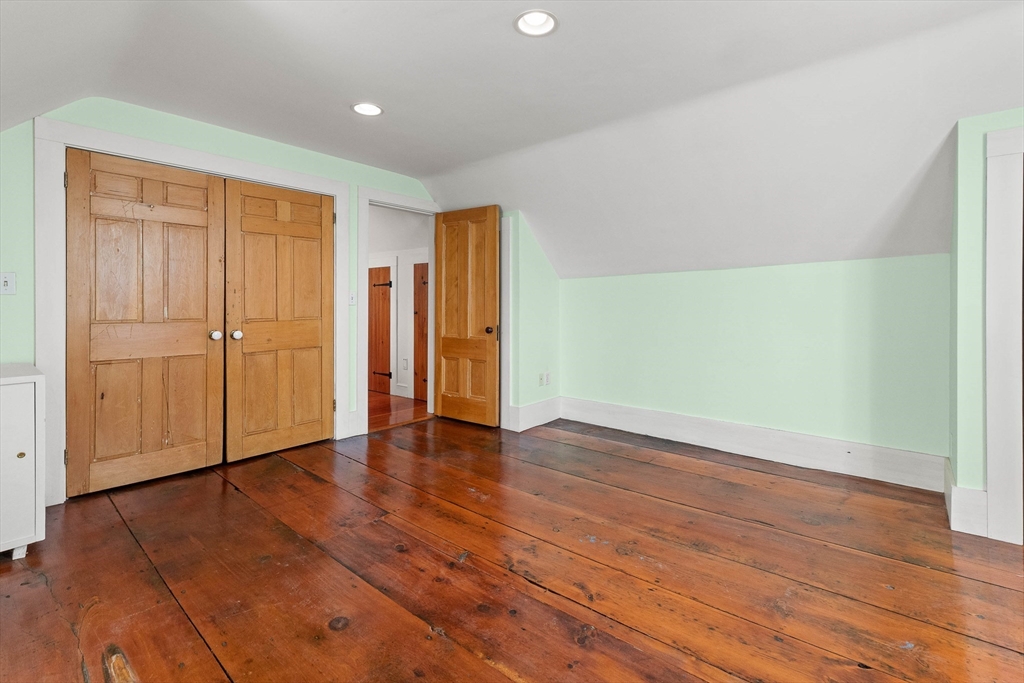 2 High Street Marblehead, MA 01945 - Photo 25 of 35 a view of an empty room with wooden floor