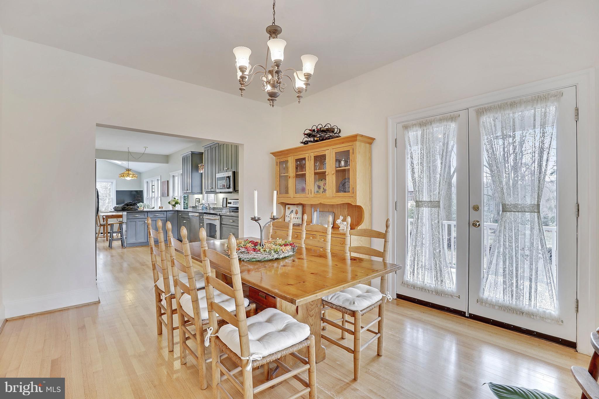 17329 Donora Road Silver Spring, MD 20905 - Photo 10 of 30 Open to Kitchen with french doors to porch