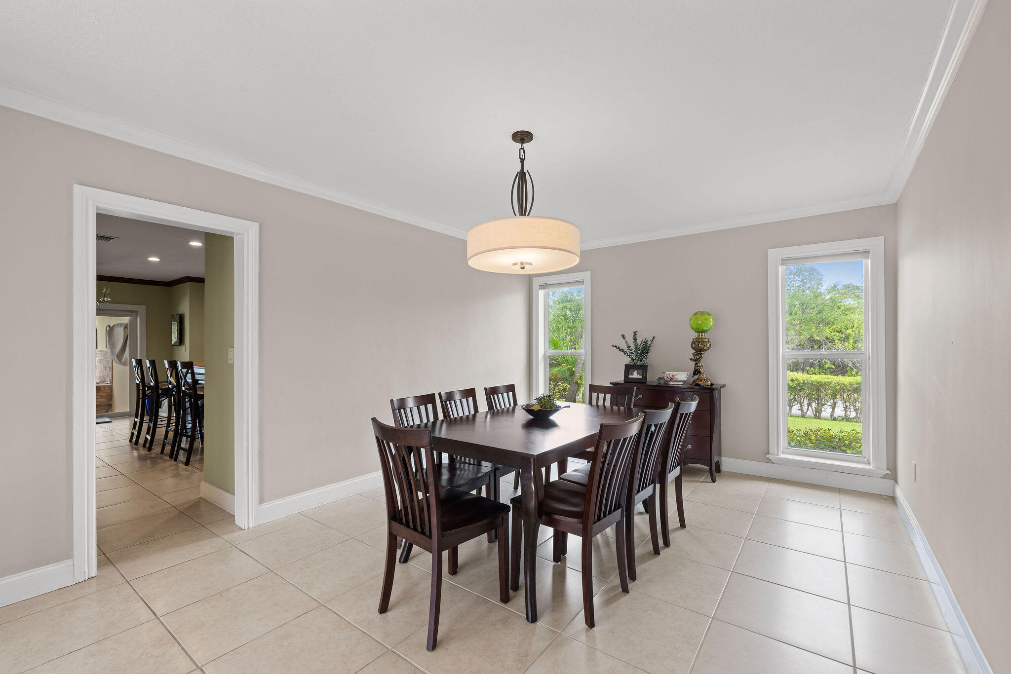 5701 Southwest 136th Street Miami, FL 33156 - Photo 5 of 25 a dining room with furniture and window