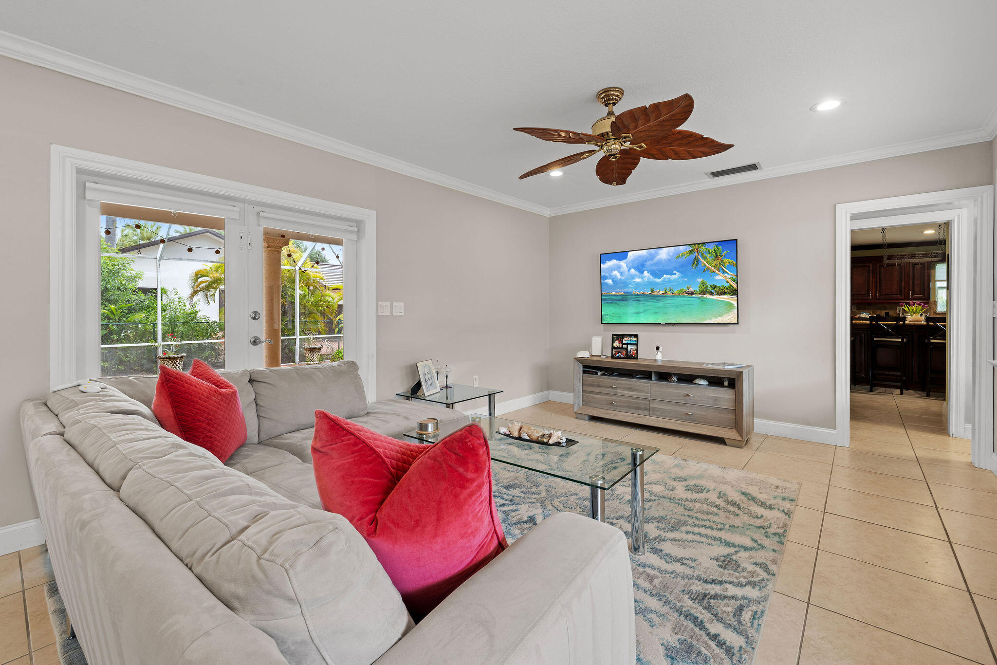5701 Southwest 136th Street Miami, FL 33156 - Photo 9 of 25 a living room with furniture and a flat screen tv
