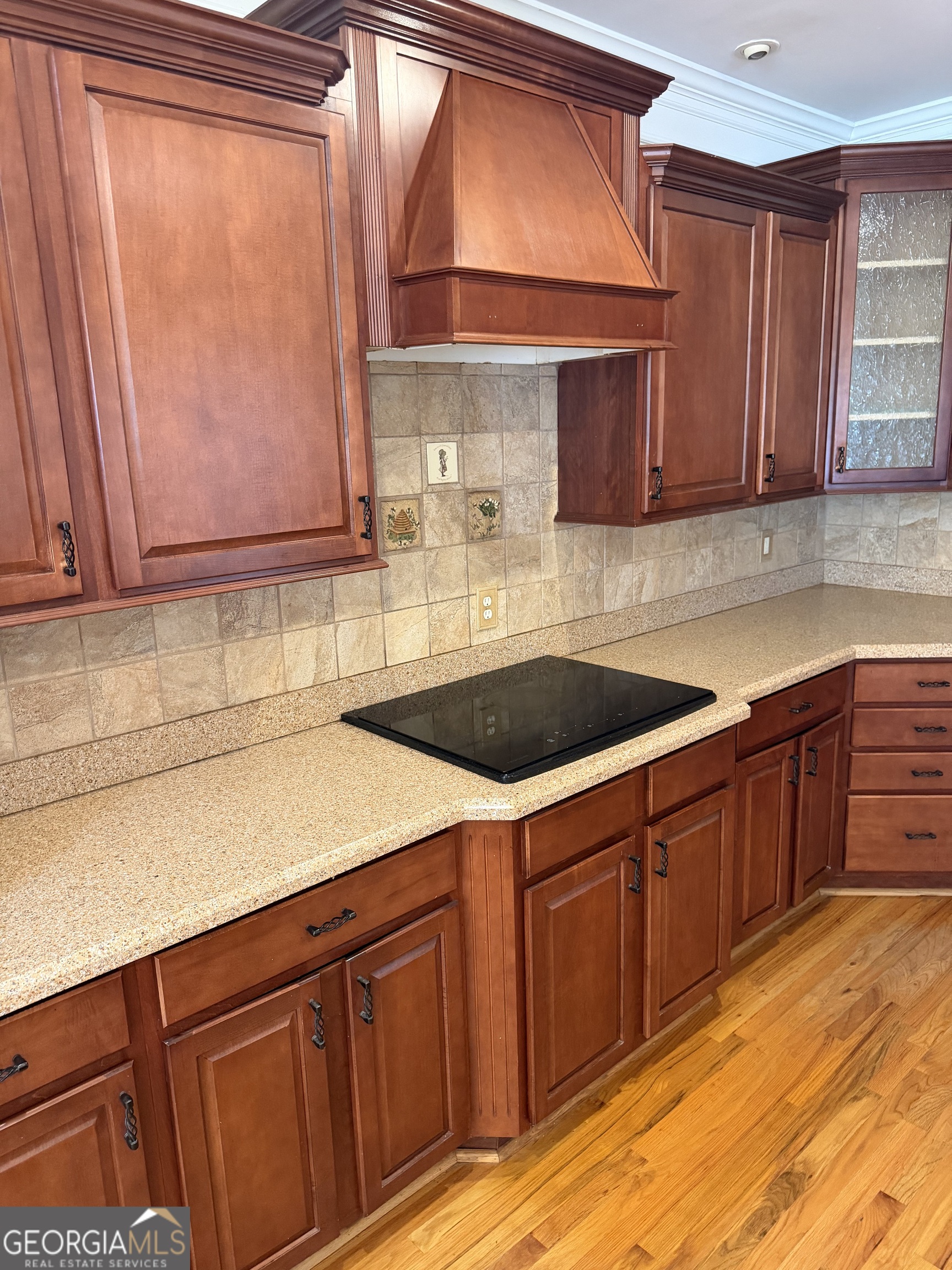 302 Norris Road Barnesville, GA 30204 - Photo 17 of 65 a kitchen with stainless steel appliances wooden cabinets and a sink