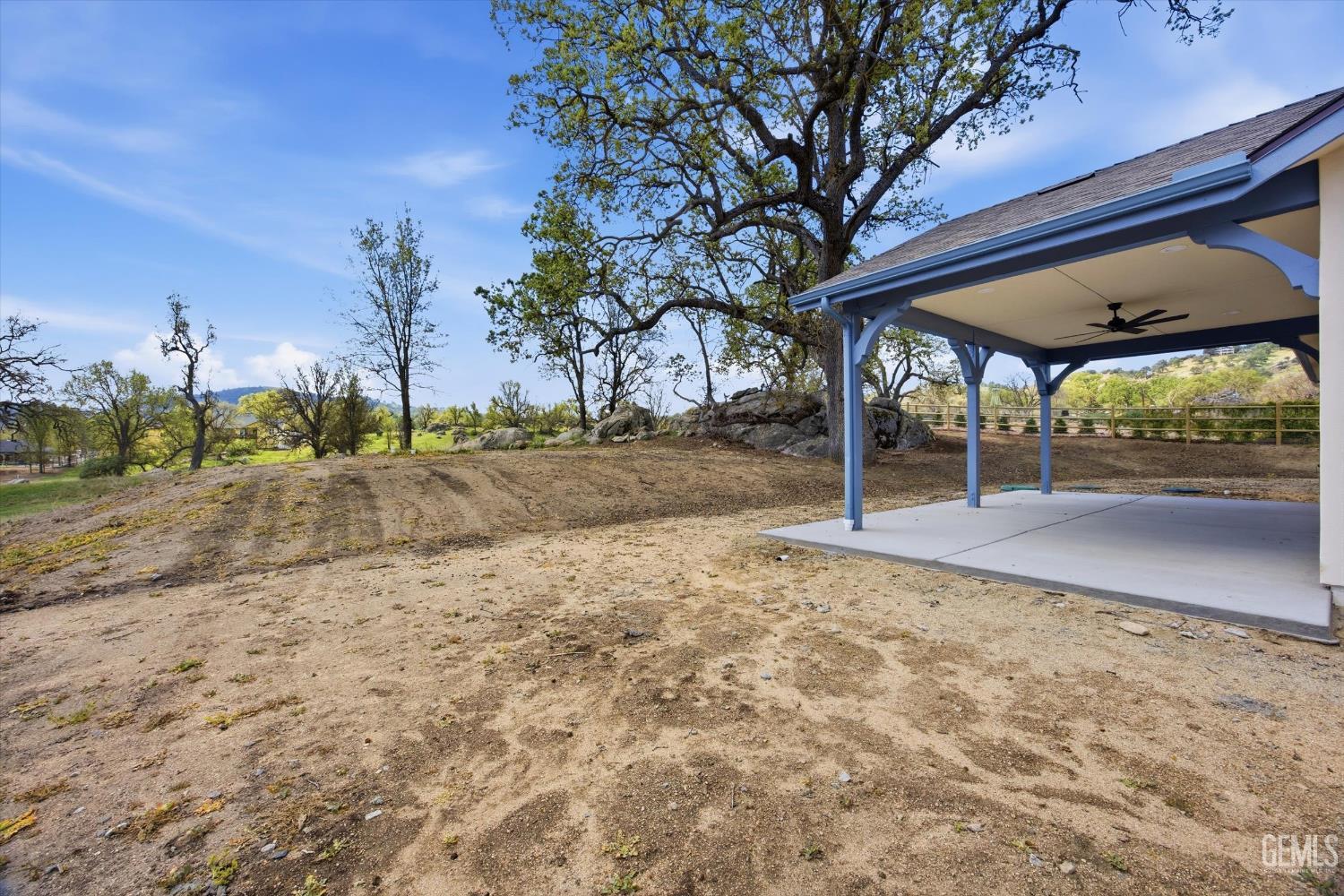 Undisclosed Address Tehachapi, CA 93561 - Photo 43 of 47 a view of a backyard with large trees