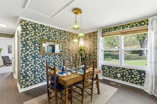 a view of a room with a wooden walls