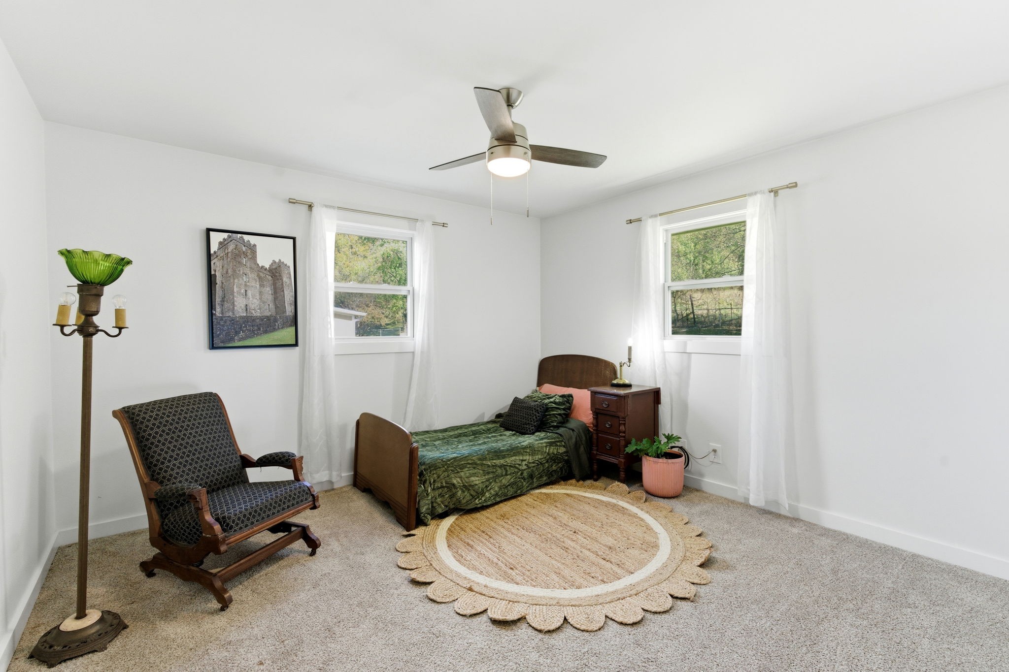 1116 Slaters Creek Road Goodlettsville, TN 37072 - Photo 26 of 36 a room with furniture and a chandelier