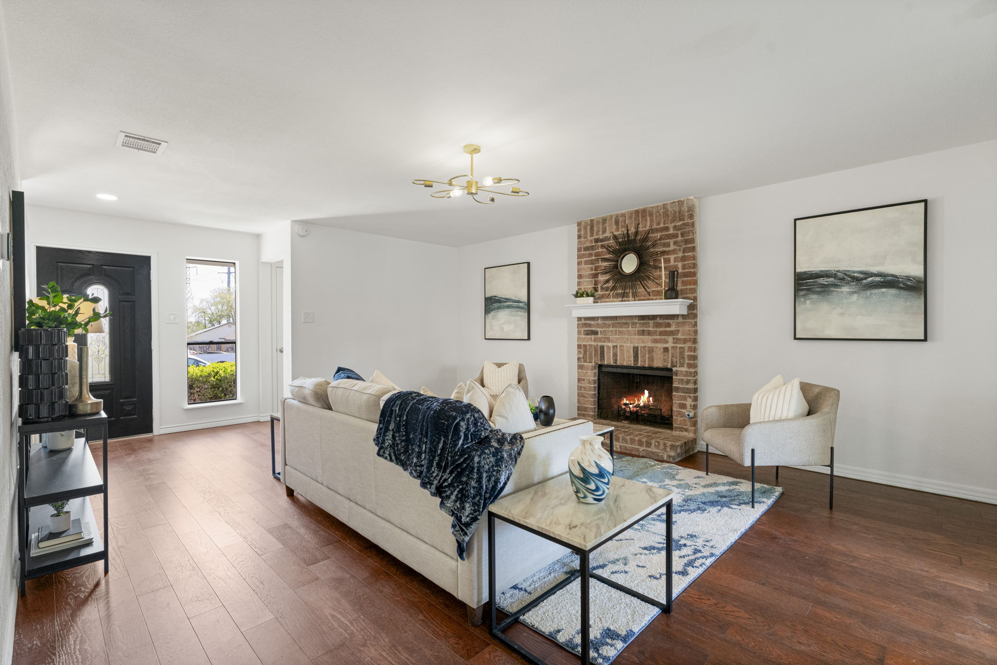 13004 Esplanade Street Austin, TX 78727 - Photo 21 of 36 a living room with furniture fireplace and wooden floor