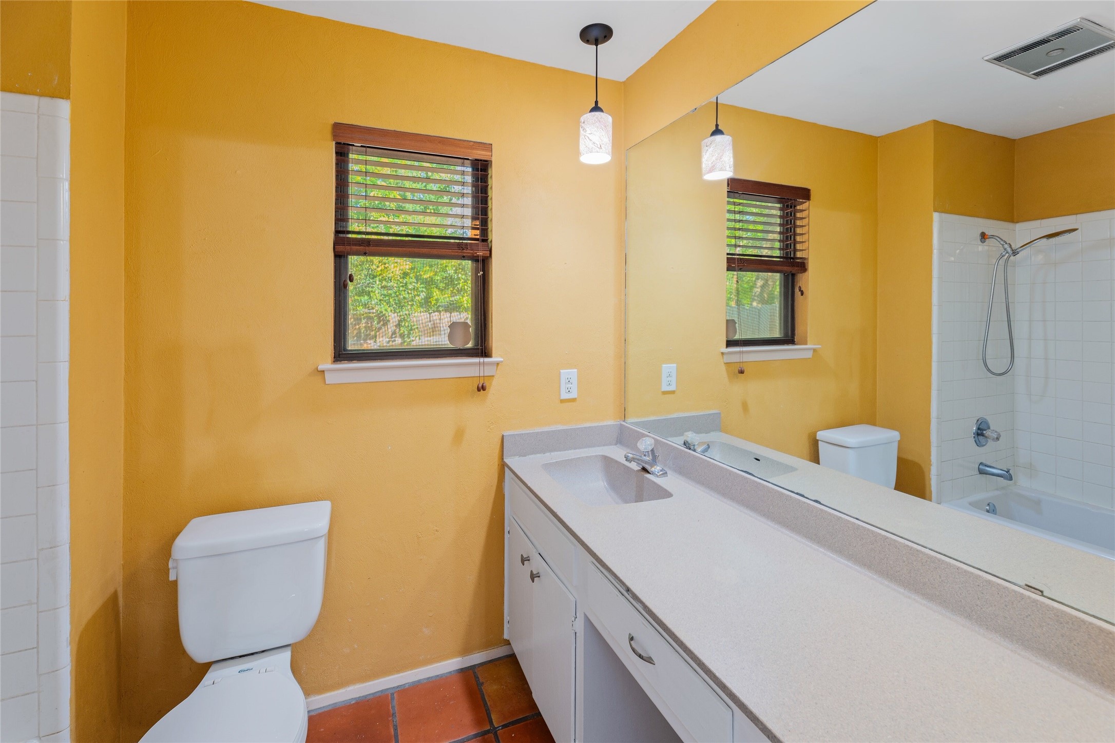 13406 Effingham Street Austin, TX 78729 - Photo 17 of 32 a bathroom with a sink and a toilet