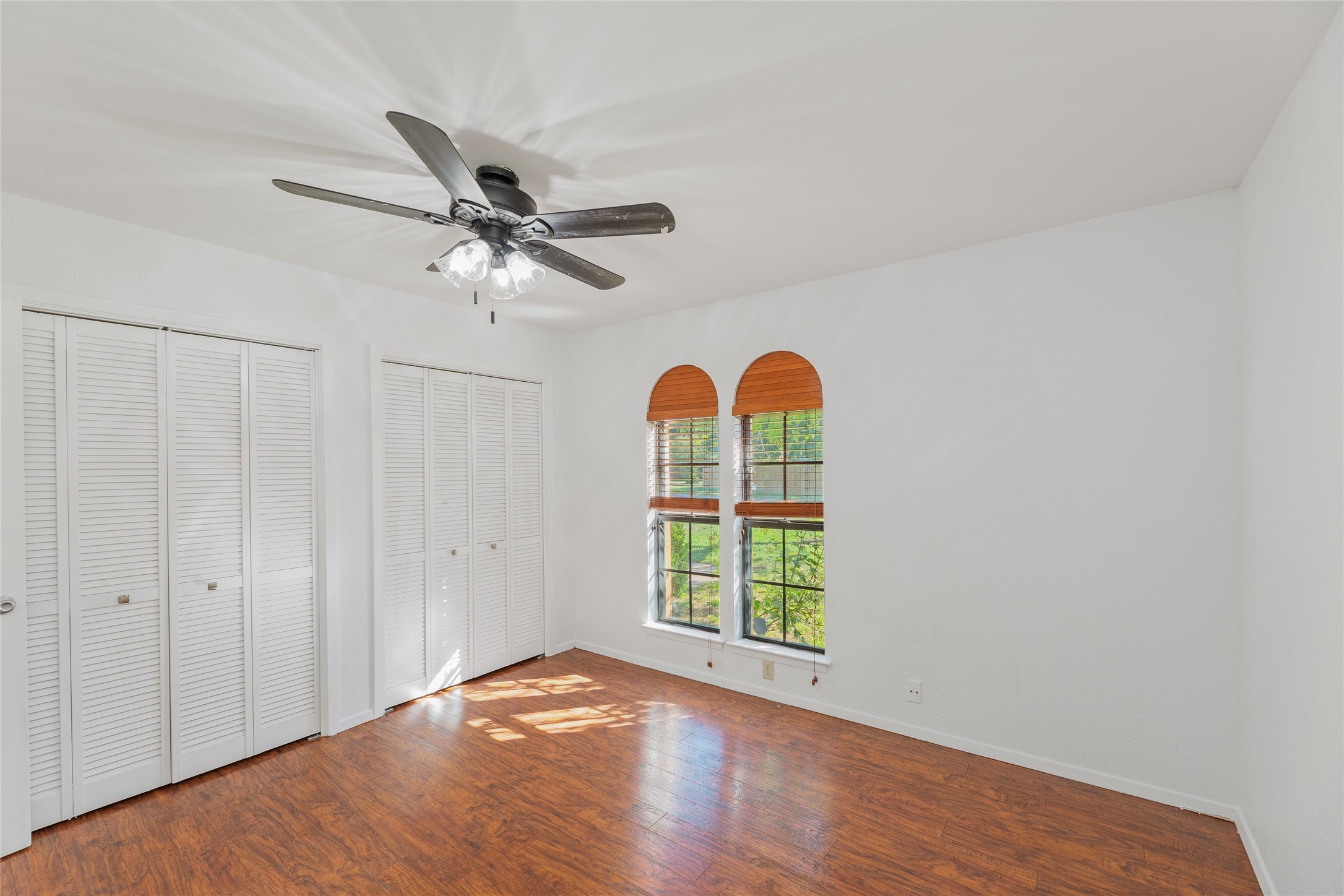13406 Effingham Street Austin, TX 78729 - Photo 24 of 32 a view of empty room with window and ceiling fan