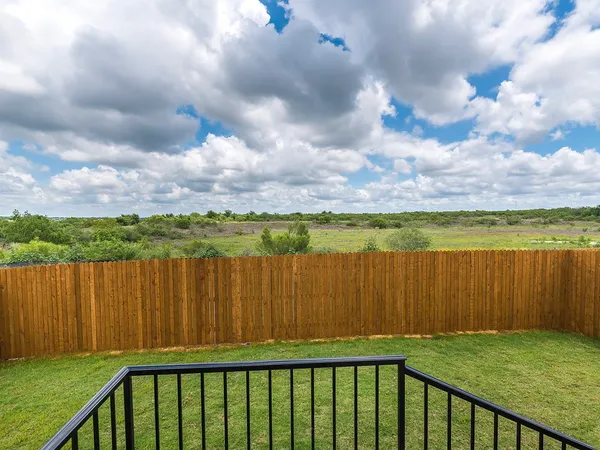 a view of a garden with a lake view