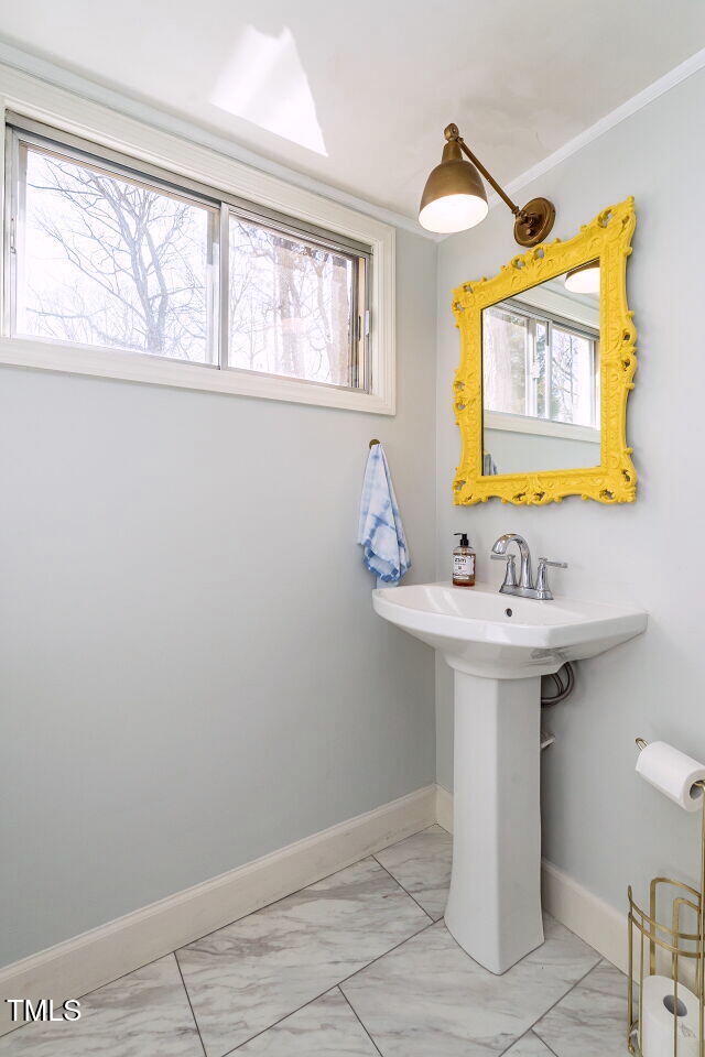 7416 Fiesta Way Raleigh, NC 27615 - Photo 18 of 27 Powder bath on main floor
