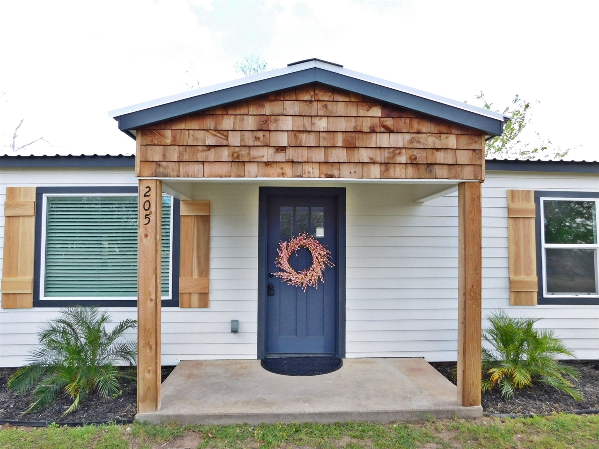 205 East Train Street Ellinger, TX 78938 - Photo 2 of 27 a front view of a house