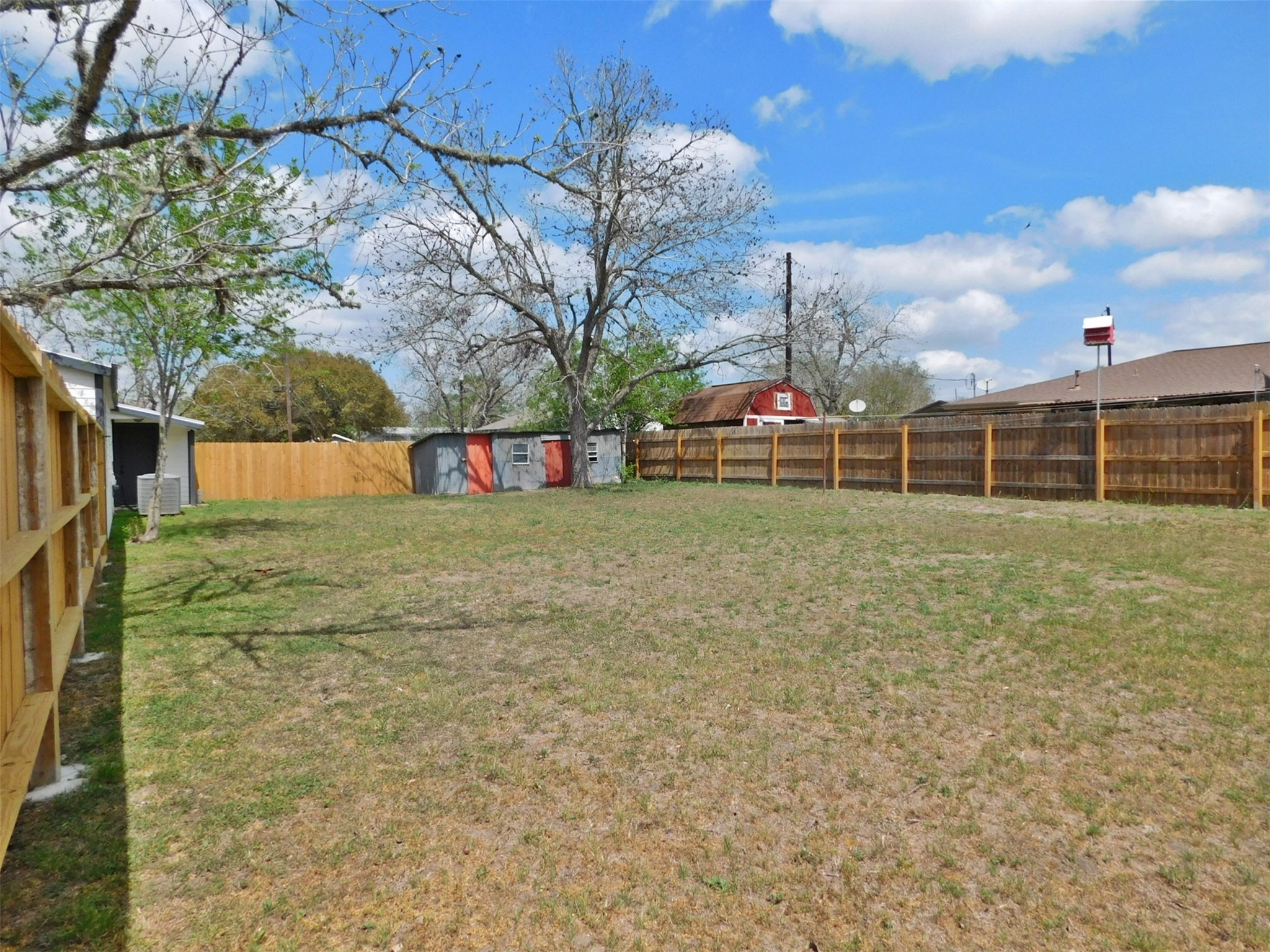 205 East Train Street Ellinger, TX 78938 - Photo 23 of 27 a view of a backyard