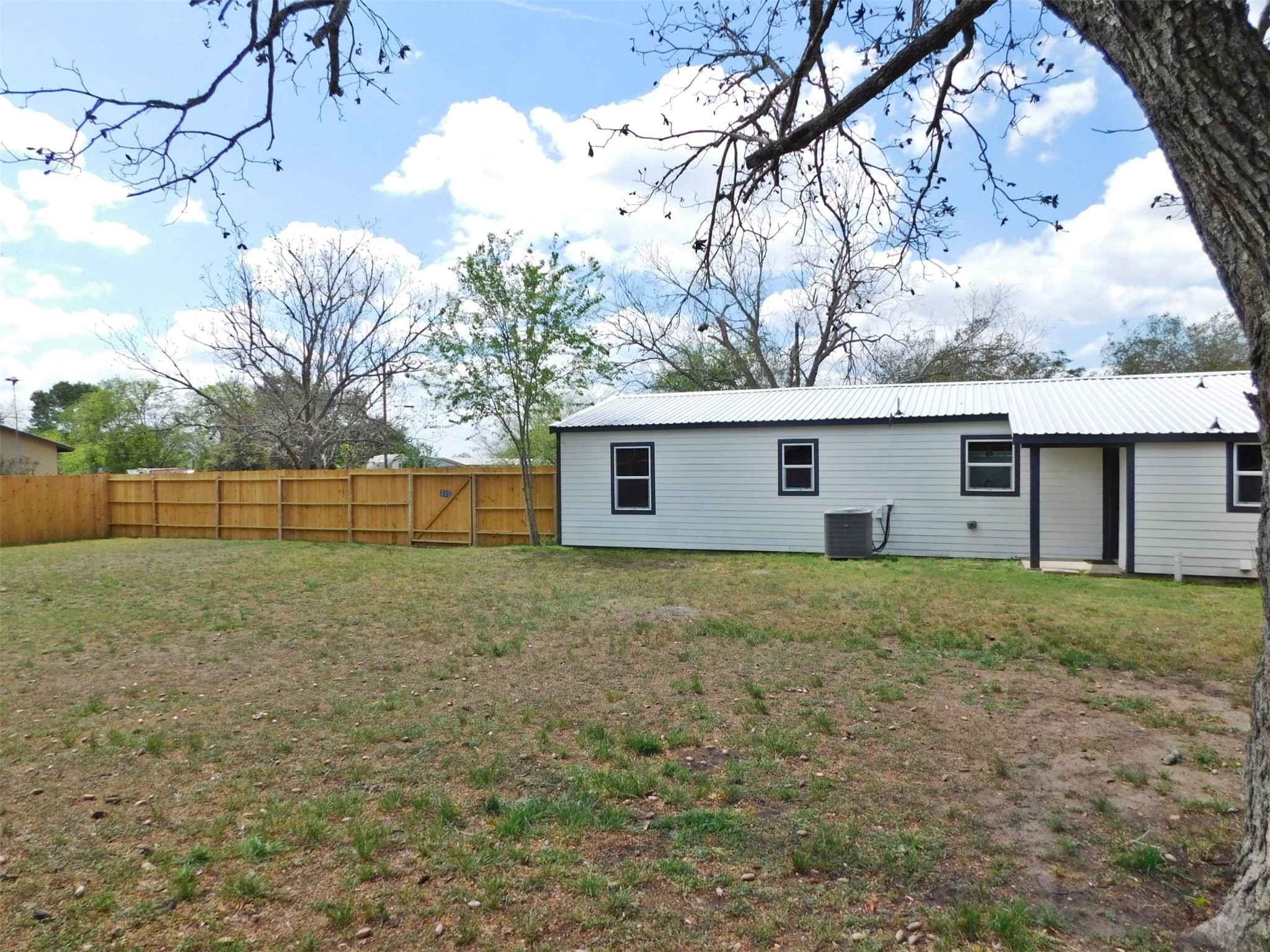 205 East Train Street Ellinger, TX 78938 - Photo 25 of 27 a view of a backyard
