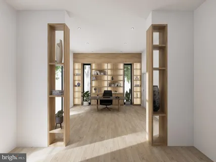 a living room with furniture and large windows