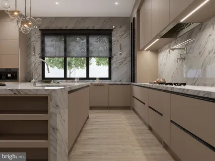 a large kitchen with granite countertop a sink and a stove
