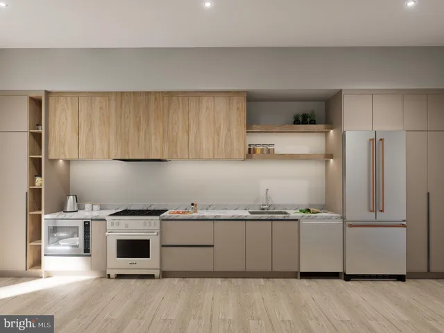 a kitchen with a sink and a refrigerator