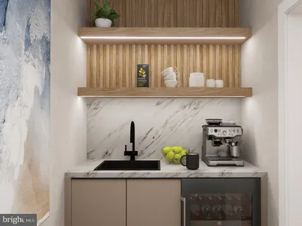a kitchen with a sink and a stove with wooden floor
