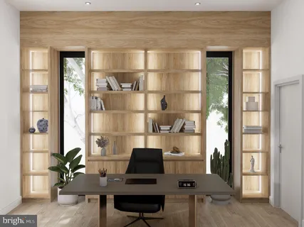 a living room with a couch and a potted plant